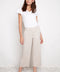 Model wearing UP! Linen Effect Techno Wide Leg Crop Pant in Linen, front view.