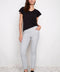 Front view of model wearing UP! Casa Soft Stream Ankle Pant in Casa print.