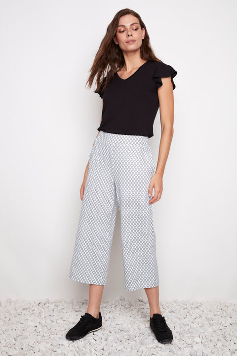 Model wearing UP! Casa Soft Stream Wide Leg Cropped Pant in Casa print, front view.