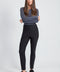 Woman wearing the Precision Ponte Slim Pant in Black.