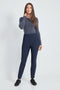 Woman wearing the Precision Ponte Slim Pant in Navy.