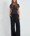 Woman wearing the Butter Wide Leg Pant in Black.