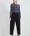 Woman wearing the Ponte Barrel-Leg Pant in Black.