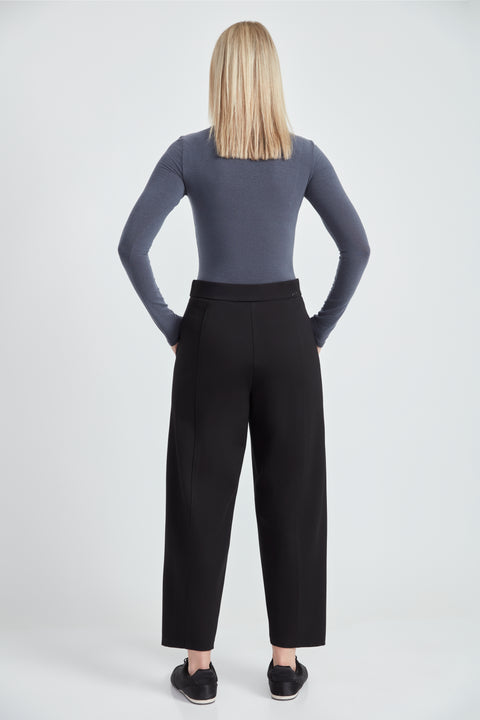 Woman wearing the Ponte Barrel-Leg Pant in Black, back view.