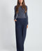 Woman wearing the Precision Ponte Wide Leg Pant in Navy.