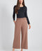 Woman wearing the Ponte Belted Gaucho Pant in Biscuit.