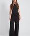 Woman wearing the Provence Wide-Leg Pant in Black.