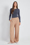 Woman wearing the Light Ponte Wide Leg Pant in Latte.