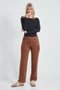 Woman wearing the Suede Straight-Leg Pendant Pant in Tobacco.