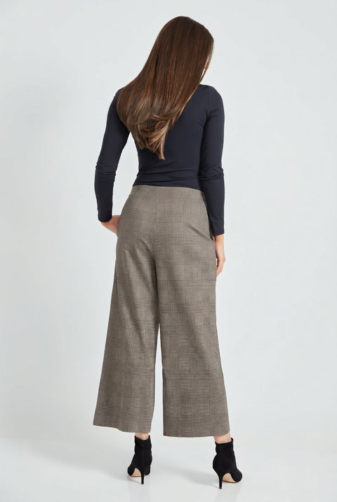 Woman wearing Ponte Chester plaid cropped gaucho wide-leg pants, back view