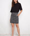 Model wearing UP! Bloom Print Techno Vented Skort in Black & White front view.
