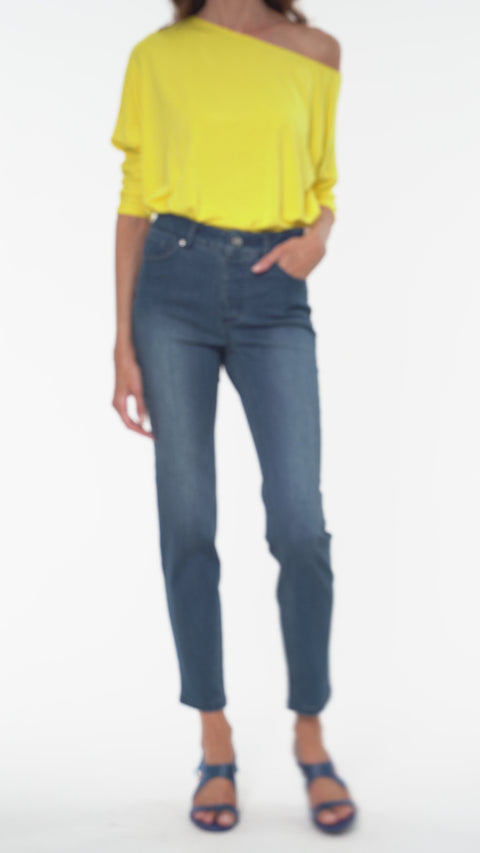 Model wearing the UP!DATED Slim Ankle Jean